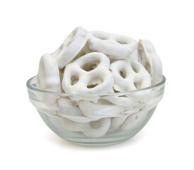 White chocolate covered pretzels on white background