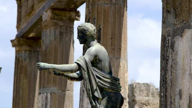 Sculpture and columns in the ancient city of Pompeii.