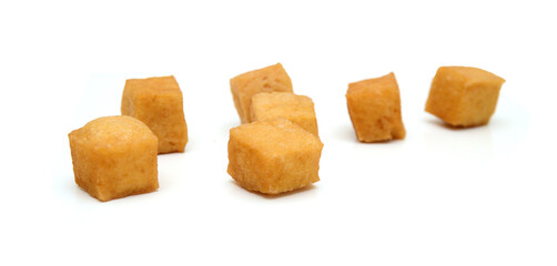 Fried tofu on a white background