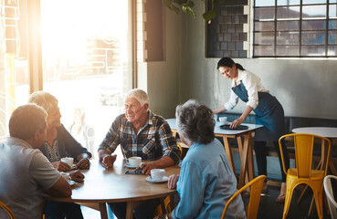 Senior, people and group relax at coffee shop with discussion of life extension drugs in retirement. Elderly, friends and talk at cafe with healthcare, story or share gossip info in old community
