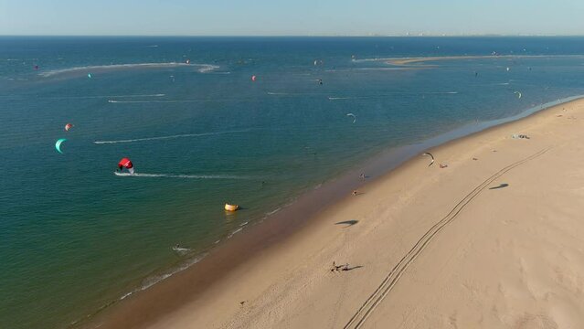 Aerial view of kitesurfers in the Netherlands.
