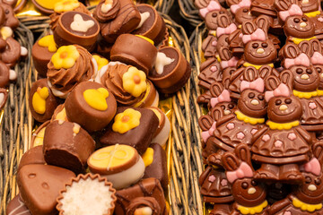 Delicious handmade and traditional chocolates decorated with fruit flavors, delicious sweet cocoa...