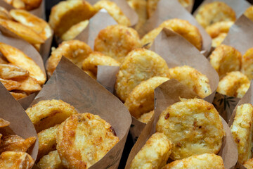 Handcrafted Potato Chips: Crispy, Golden-Brown Snacks Bursting with Savory Flavor, Perfect for Snacking or Pairing with Meals