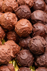 Delicious handmade and traditional chocolates decorated with fruit flavors, delicious sweet cocoa delights with different decorations