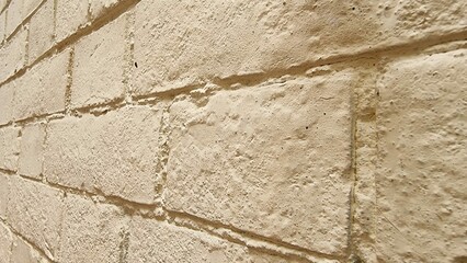 close-up yellow bricks wall texture. Background backdrop