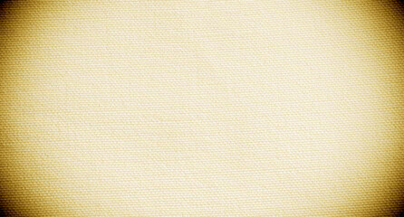 Yellow canvas fabric background texture with dark vignette . Brown yellow fabric abstract background with copy space for design.  