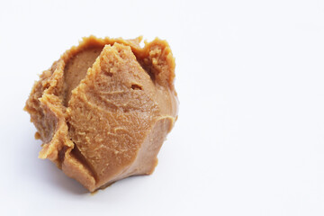 Japanese miso paste on white background.