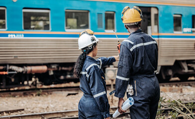 Rail engineers assess trains and infrastructure, planning eco-friendly upgrades to reduce CO2.