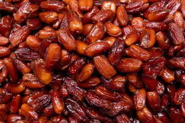 Dehydrated fruits and traditional nuts, nutritious and delicious foods: a colorful combination of vegetarian and healthy foods.