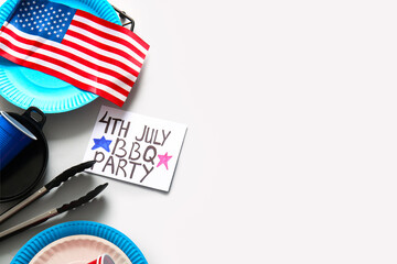 Card with text 4th JULY BBQ PARTY, dinnerware and USA flag on grey background