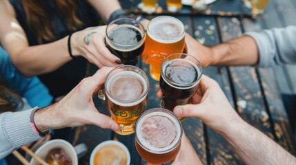 A group of friends raising their glasses in a toast, enjoying a variety of craft beers from around the world in celebration of International Beer Day..
