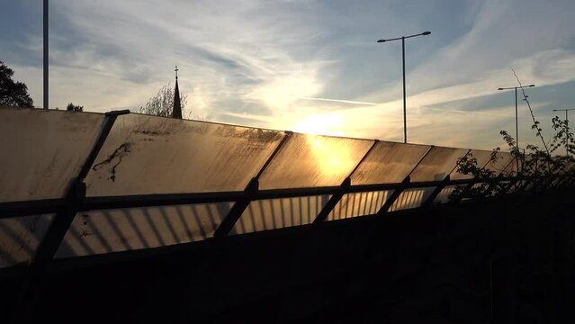 Stockholm, Sweden Traffic at sunset on the Essingeleden and E4 elevated highway in the Grondal district. 