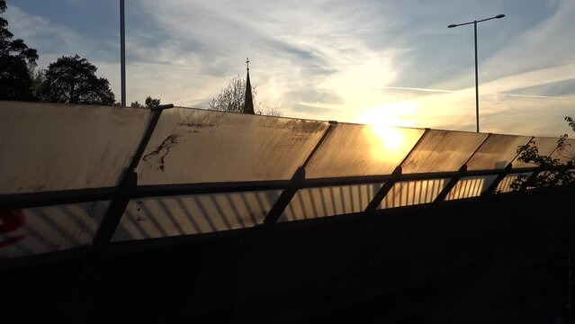 Stockholm, Sweden Traffic at sunset on the Essingeleden and E4 elevated highway in the Grondal district. 
