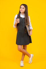 School girl holding coffee cup, learning and education. Coffee break and school recess. Back to school. Teenager student plastic takeaway cup drink cocoa or tea beverage.