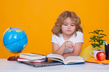 Back to school. Funny little child from elementary school with book. Education. Kid study and...
