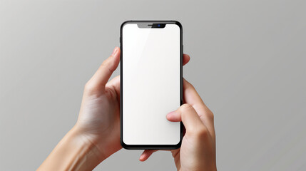 Hand holding handphone smartphone on a gray background