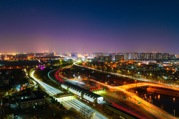 Fototapeta premium Night View of Highway and Subway Linked to Beijing Central Business District