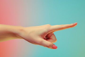 A hand with painted nails is pointing to the right on a blue and pink background.