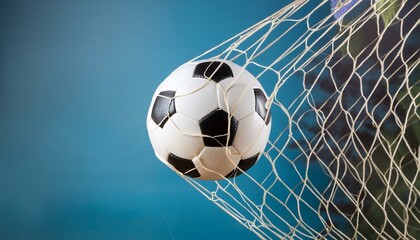 Netted Brilliance: Soccer Ball Against Azure Sky