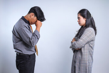 Conflict of Two Young Asian Businessman And Businesswoman. Woman Scolding Man. Worker Fired