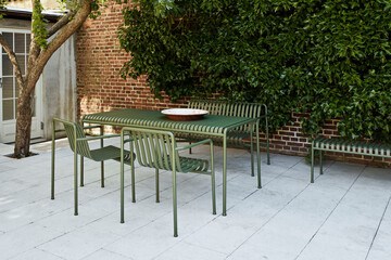 Dining bench armchair table olive with garden furniture during summer