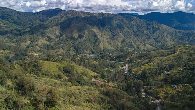 Aerial view of a fertile green valley in the highlands of Chimbu Province in PNG.