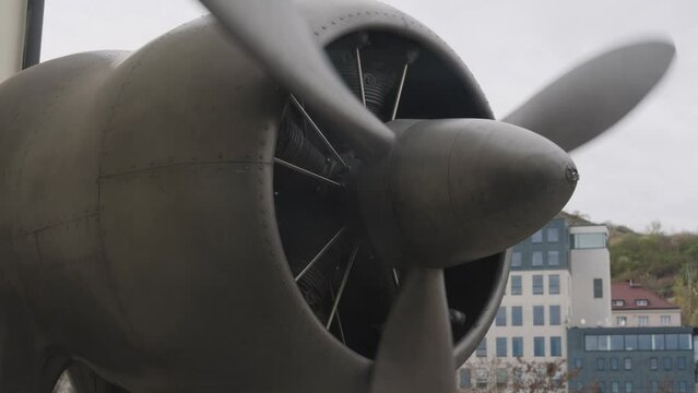 Metallic radial plane engine propeller spin, museum exposition, Prague