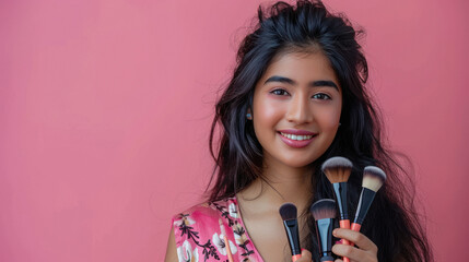 beautiful woman posing for a makeup brush brand