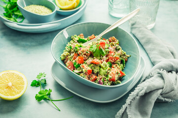 Tabbouleh salad. Fresh homemade Tabouli salad with fresh parsley, onions, tomatoes and hempseeds