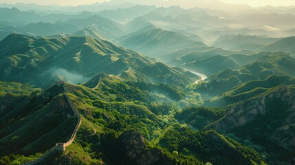 Aerial view of the Great Wall of China stretching across rugged mountains and valleys, with sections winding over steep ridges and through lush forests.     