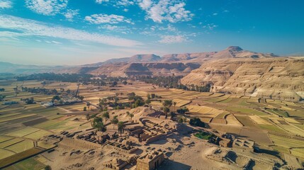 Aerial view of the Valley of Kings in Egypt, showcasing the ancient tombs and the surrounding desert landscape near Luxor.     