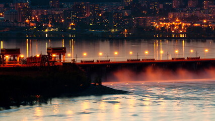 Zhigulevskaya hydroelectric power station on the Volga River during the spring release of water at night