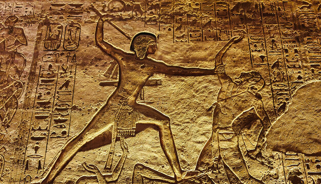 Famous wall bas relief with a scene from the Battle of Kadesh in 1274 BC depicting Ramesses II slaying his enemies inside the rock cut Great Temple of  Abu Simbel built by Ramesses II in Nubia,Egypt