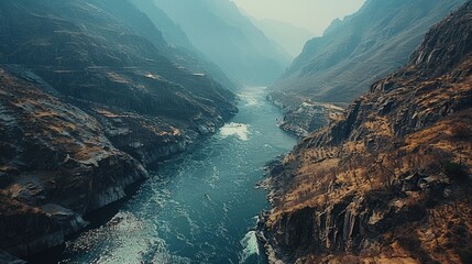 Aerial view of the Tiger Leaping Gorge in China, showcasing the dramatic river gorge with its steep...