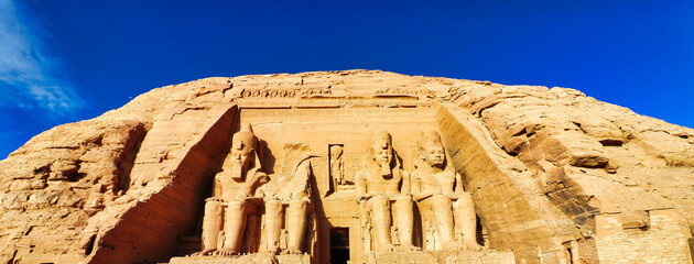 Magnificent view of the Great Temple of Ramesses II at Abu Simbel with the imposing Colossi of...