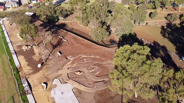 Aerial orbit over playground cyclepath construction after flooding, Riverlinks Park Clarkson Perth