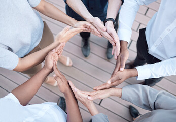 People, business and hands in circle for teamwork in day for solidarity, support and diversity in...