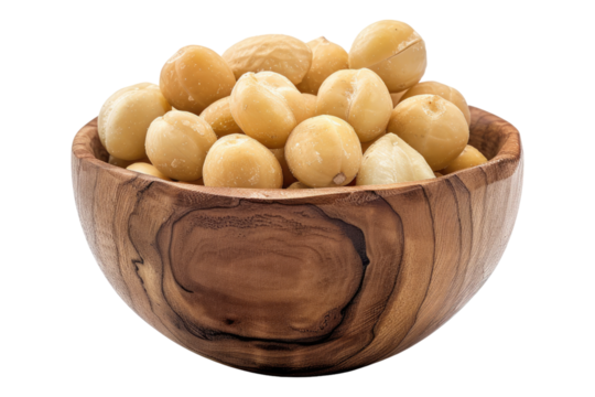 Macadamia in a wooden bowl isolated on transparent background