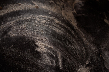 light flour on a dark table abstract picture