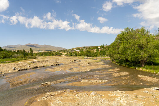 A river with a cloudy sky in the background