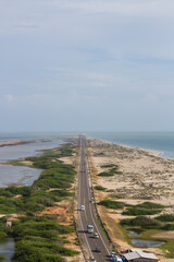 Fototapeta premium Top view of the road to Dhanushkodi, India. High angle view of the road to the sea, taken from above.