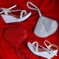 shoes and handbags on a red background
