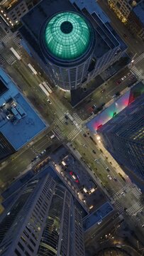 Vertical Screen: Captured From Above, The Glowing Dome And City Streets Of Downtown Seattle Illuminate The Night. Dynamic Traffic Movement Evident. 4K Footage. 