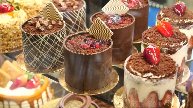 chocolate and cream cake display for sale at cafe 