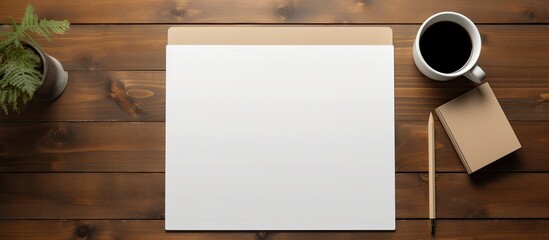 The artist s home office desk is adorned with a clipboard tablet pad featuring a blank paper sheet creating a spacious and inviting workspace This top down view mockup provides ample copy space for c