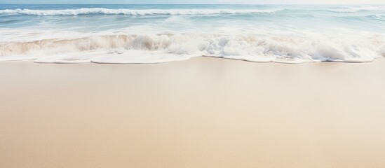 A close up image of a sandy beach with ample space for copying