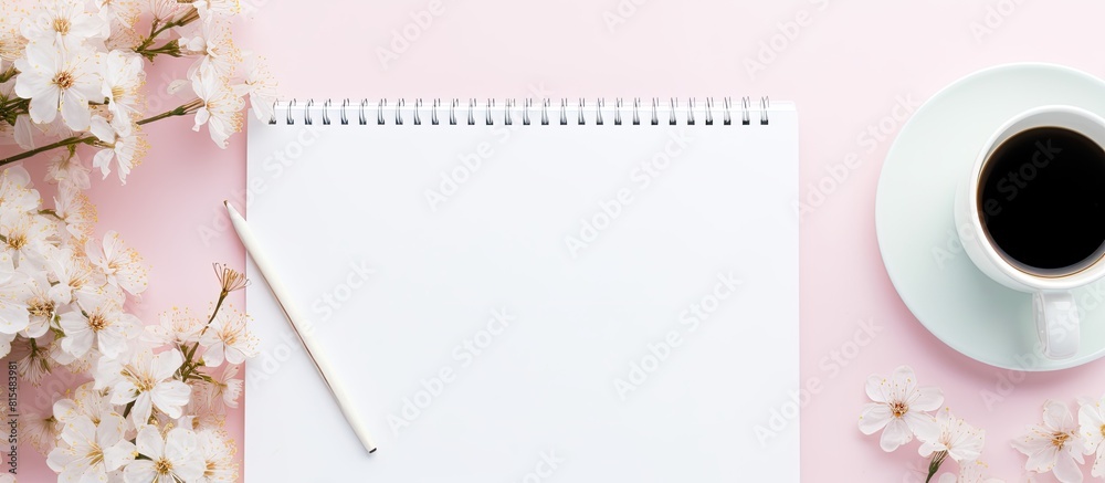 Poster top view of a beautifully arranged workspace desk with a coffee cup and a notebook this feminine and