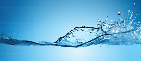 Copy space image of a water splash with a blue background