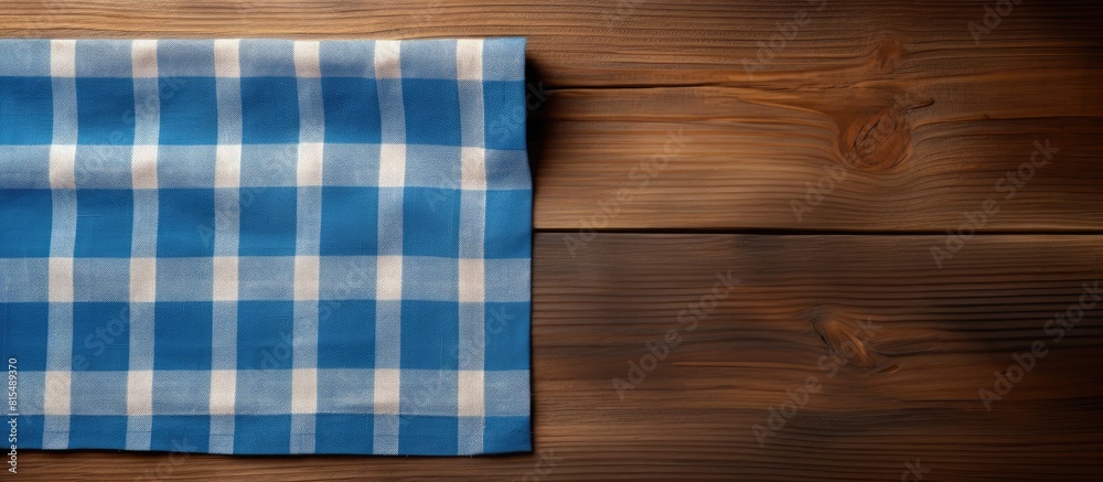 Aufkleber a wooden background with a kitchen cloth napkin available for use and a space for additional content
