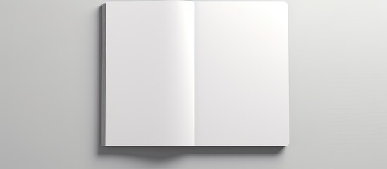 A notebook is seen in a copy space image against a white background